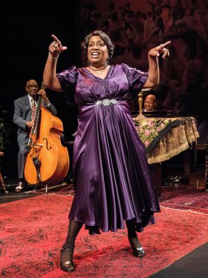 Miche Braden presenting herself in The Devil's Music show